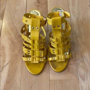 Yellow BCB Girls sandal heels.